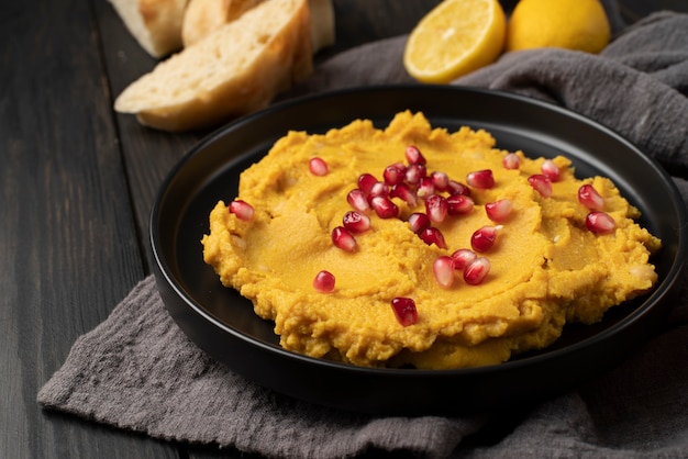 Colorful and tasty hummus with ingredients