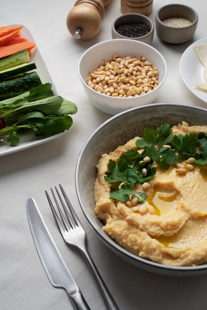 Colorful and tasty hummus with ingredients