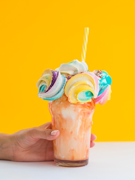 Colorful tasty milkshake composition