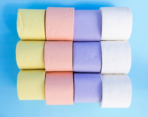 Colorful toilet paper rolls on desk