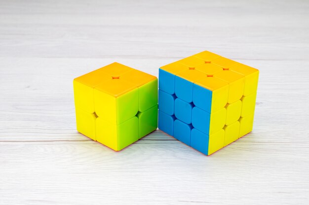 colorful toy constructions designed shapeded on light desk, toy plastic