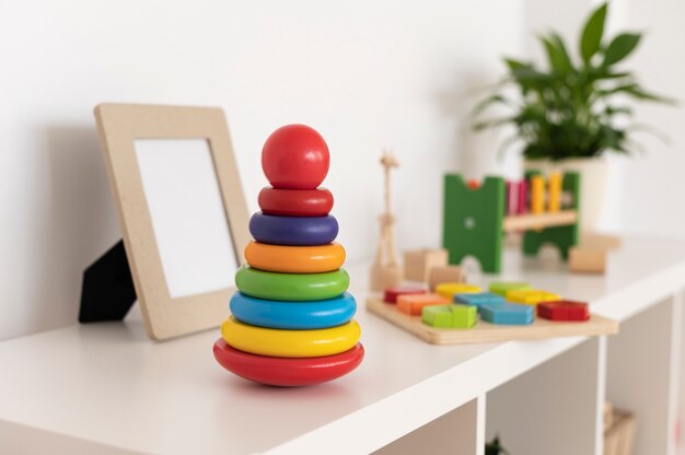 Colorful toys arrangement on shelf