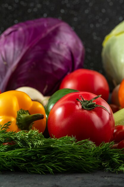 Colorful vegetables fresh ripe multi-colored vegetables on grey background
