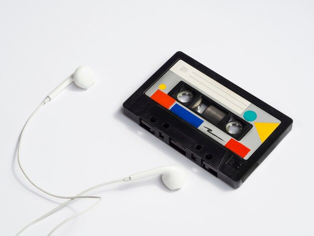 Colorful vintage cassette tape with headphones