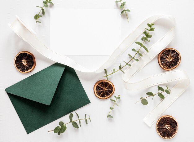 Colorful wedding invitation on table