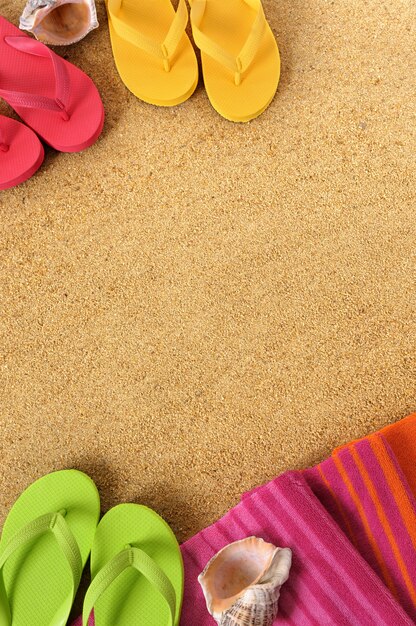 Coloured flip flops on the beach