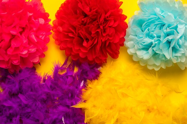 Colourful carnival objects on yellow background