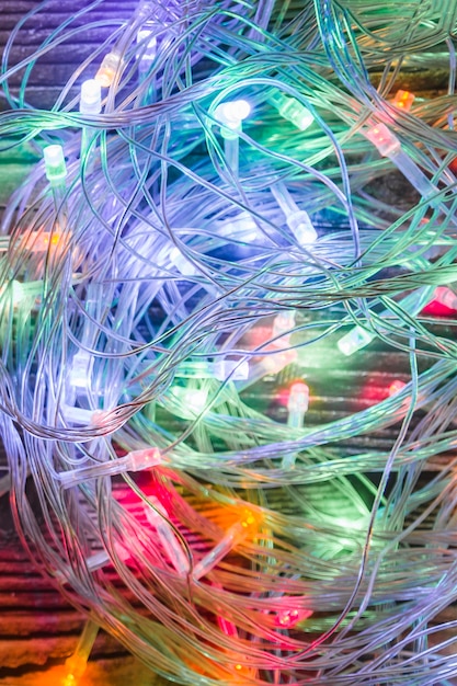 Colourful garland on wooden table 