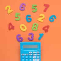 Free photo colourful math numbers with calculator close-up