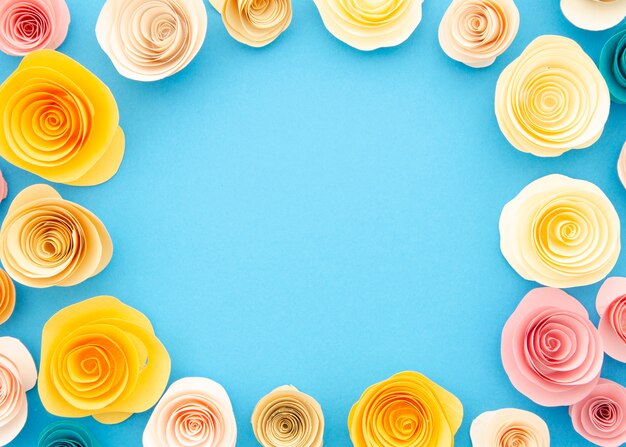 Colourful ornamental frame with paper flowers