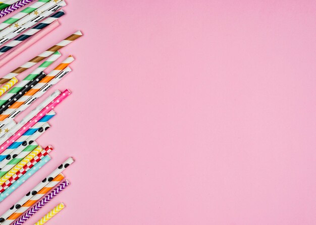 Colourful paper straws copy space