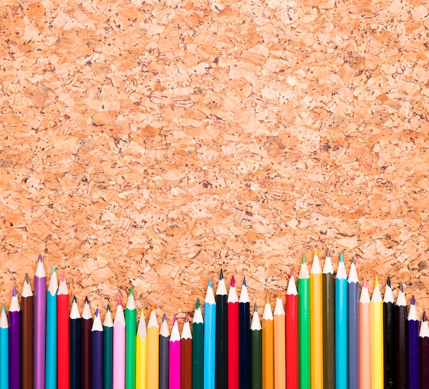 Free photo colourful pencils on desk