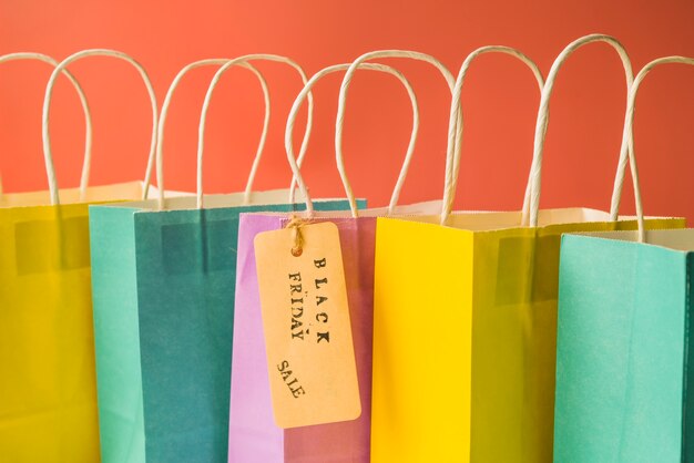 Colourful shopping bags with tag 