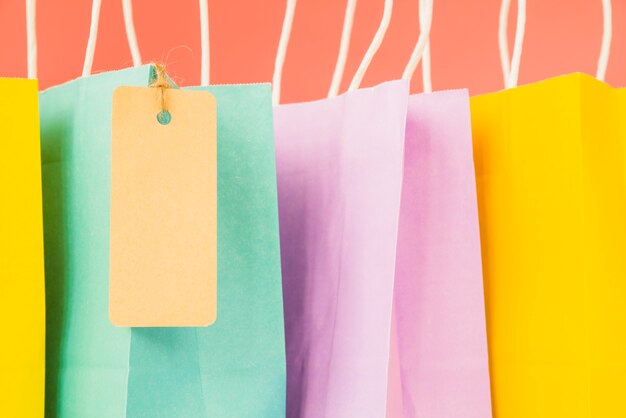 Colourful shopping bags with tag