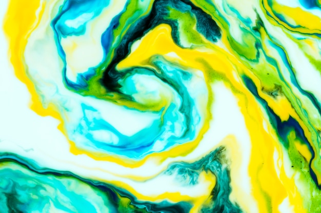 Free photo colourful swirls of oily paint texture