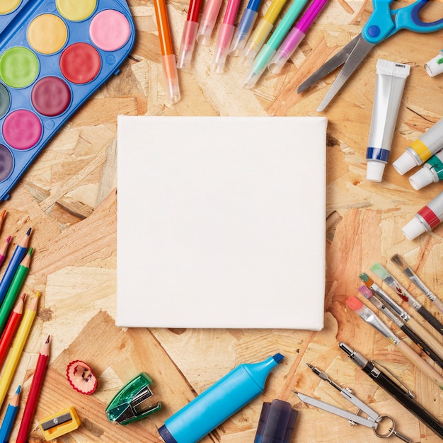 Colourful wooden desk with stationery items