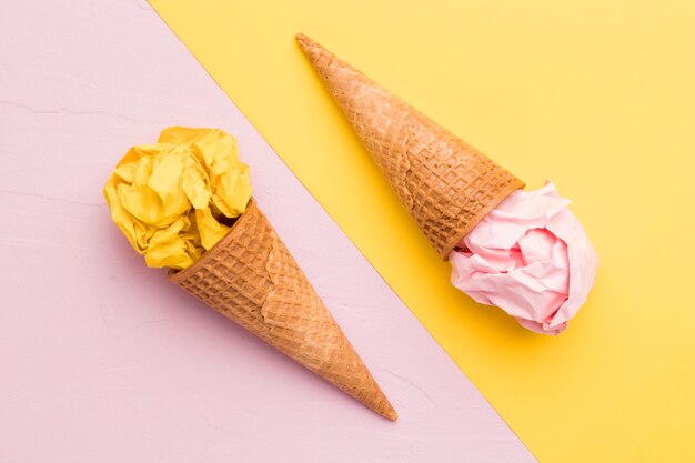 Combination of crumpled paper and ice cream cones