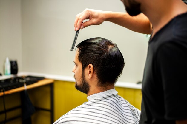 Combing hair over the shoulder shot