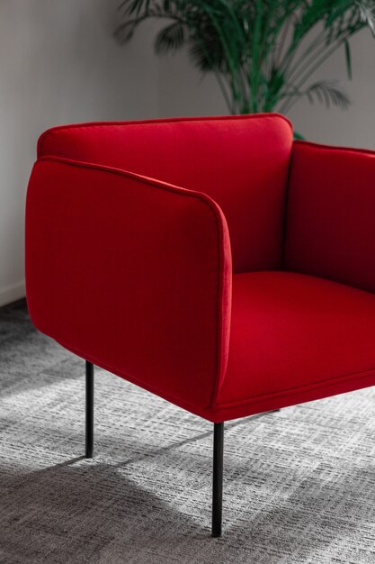 Comfortable red armchair in room