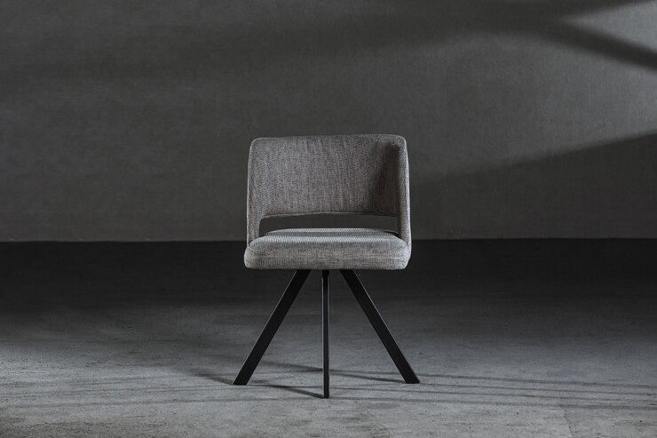 Free Photo comfy wing chair in the carpenter's workshop