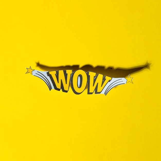 Comic lettering wow in retro pop art style with shadow