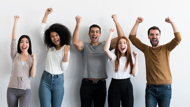 Community of adult people cheering together