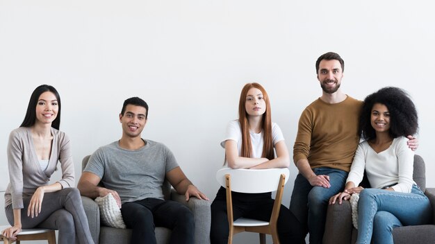 Community of young people relaxing together