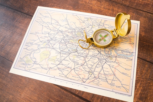 Free photo compass and england map high view