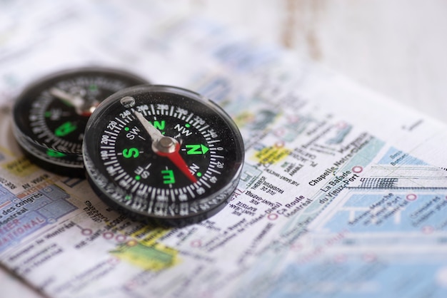 Free photo compasses wtih defocused map