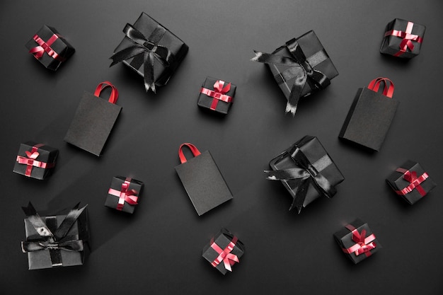 Free photo composition of black friday gifts and shopping bags