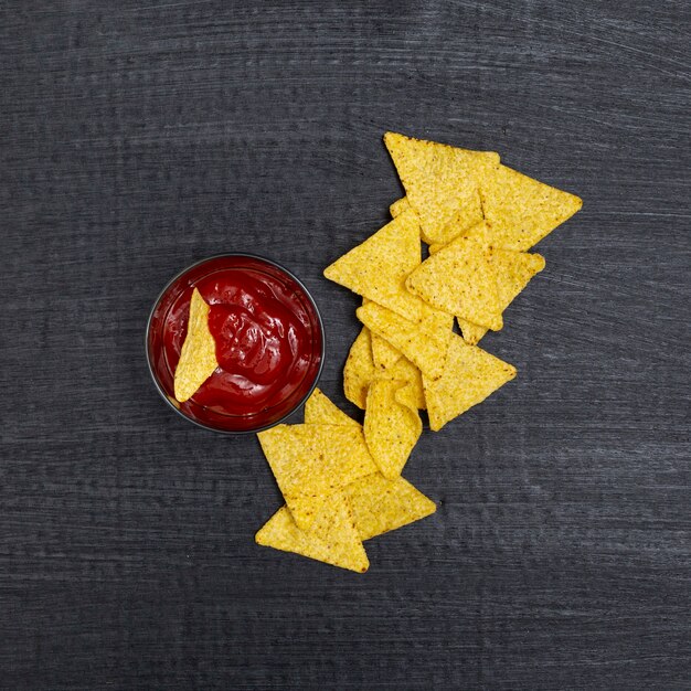 Composition of c in rectangular and ketchup in small bowl