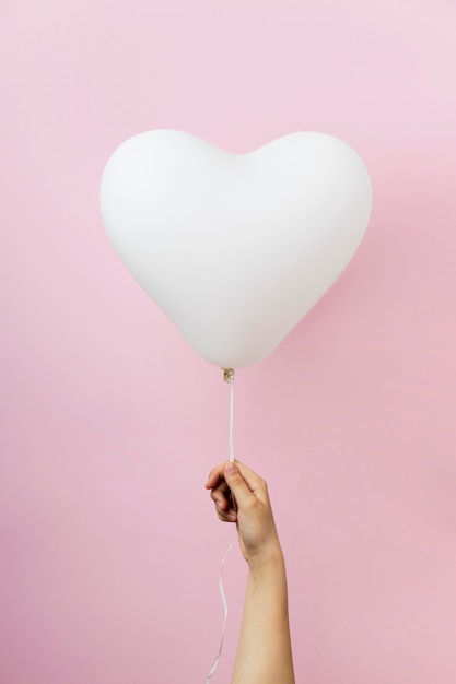 Composition of cute heart balloon