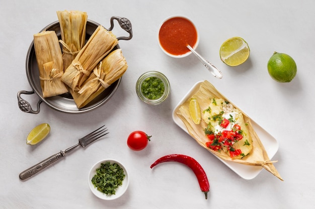 Composition of delicious tamales on plate