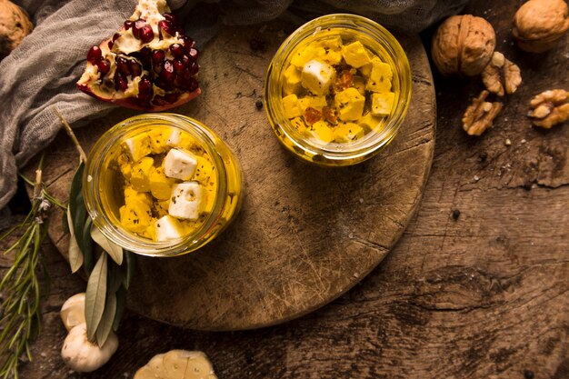 Composition of different delicacies on wooden table with copy space