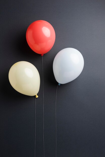 Composition of different festive balloons