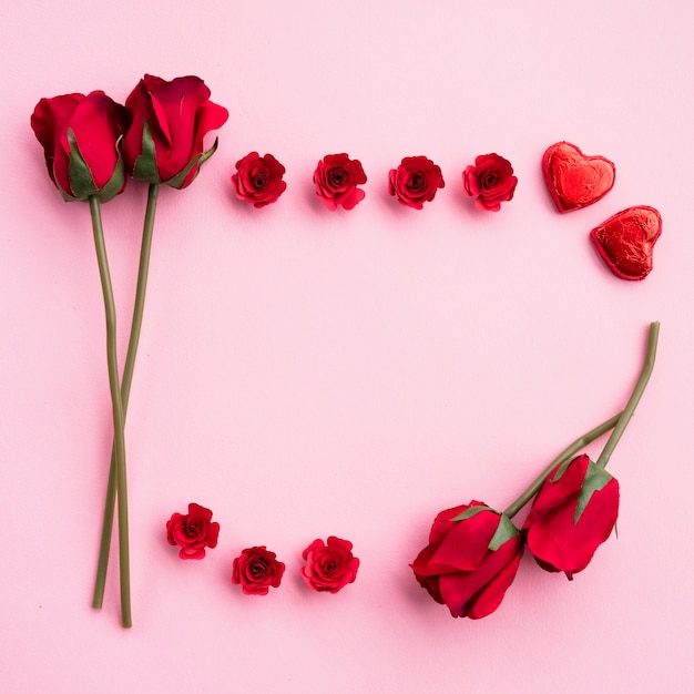 Composition of flowers and ornament hearts 