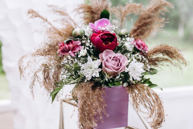 Composition of flowers stand on a table