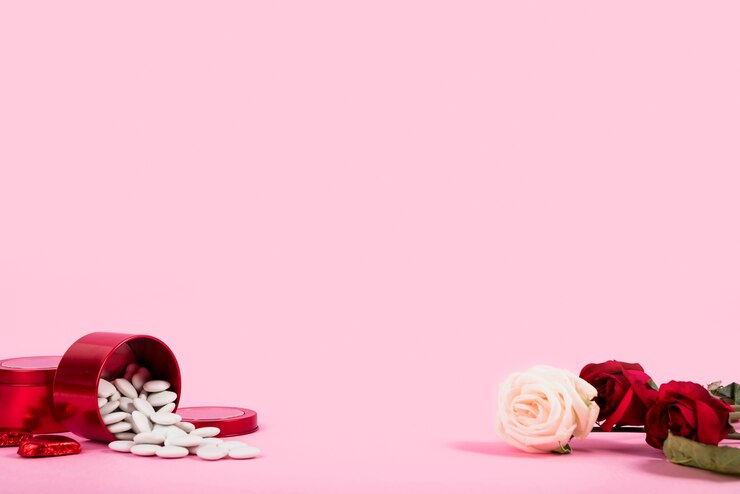 Free Photo composition of fresh flowers and red boxes 