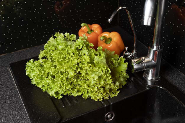 Composition of healthy food being washed