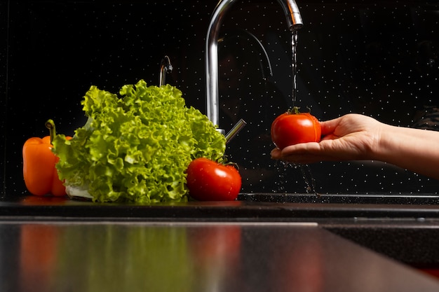 Composition of healthy food being washed