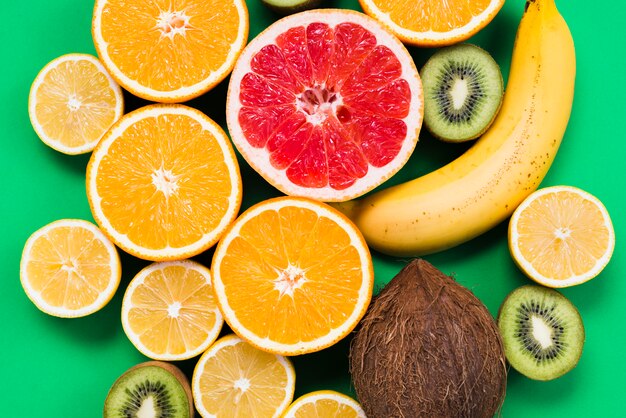 Composition of sliced colorful tropical fruits