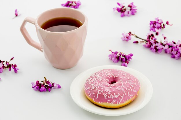Composition of tea with donuts