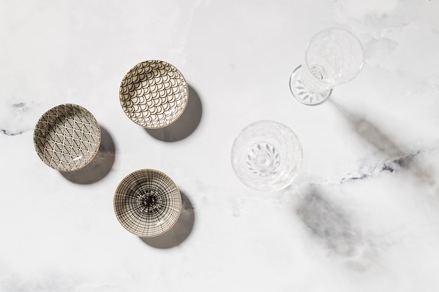 Composition of various crockery on marble table