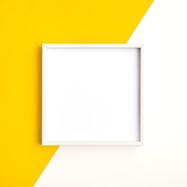 Free photo composition of white empty frame on wall