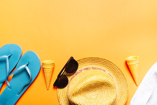 Composition with beach objects on multicolored background