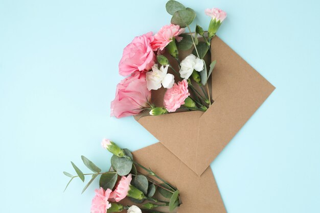 Composition with beautiful flowers and envelopes