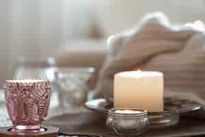 Free photo composition with candles on the table in the living room