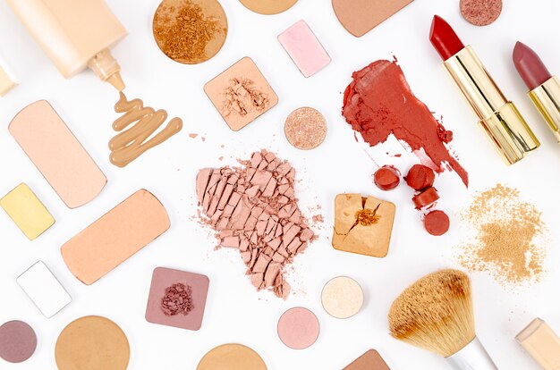 Composition with colorful cosmetics on white background