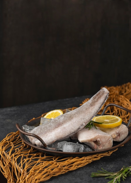 Composition with frozen fish on the table