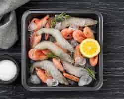 Free photo composition with frozen sea food on the table